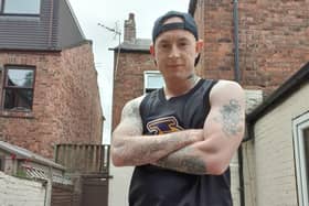 Aaron Woodward aims to run around the DW Stadium 200 times
