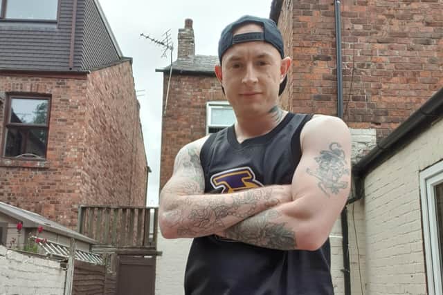 Aaron Woodward aims to run around the DW Stadium 200 times