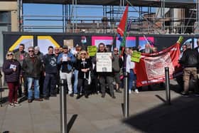 Demonstrators outside the former Galleries in Wigan town centre
