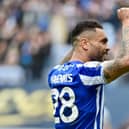 Josh Magennis celebrates opening the scoring for Latics