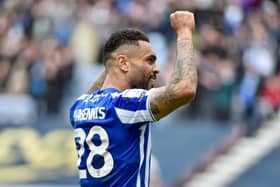 Josh Magennis celebrates opening the scoring for Latics