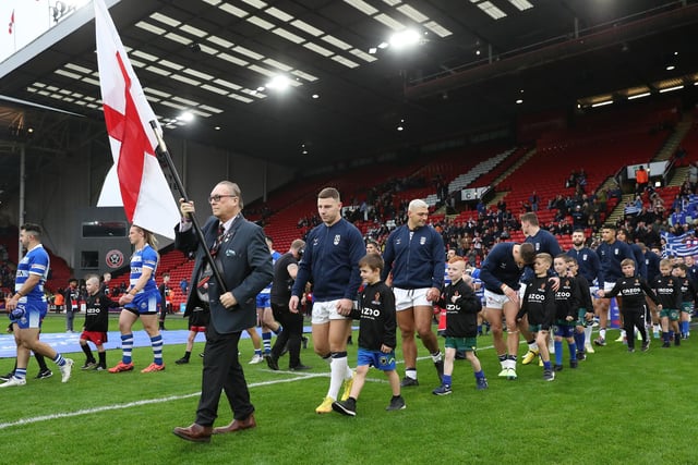 The two teams walk out at Bramall Lane (Photo by Alex Livesey/Getty Images for RLWC)