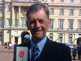 Mel receiving his MBE in 2014