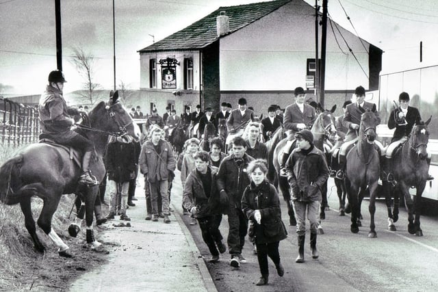 Sabateurs try to disrupt the Holcombe fox hunt outside Gallaghers pub, Little Scotland, near Aspull on Saturday 14th of February 1987.