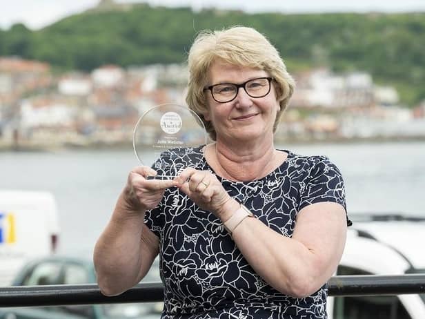 Julie Webster with her award