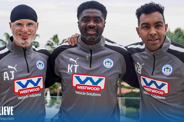 Kolo Toure (centre|) with support team Ashvir Johal (left) and Kevin Betsy (right)