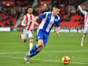 Kell Watts in action against Stoke