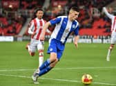 Kell Watts in action against Stoke