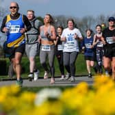 Participants pass through Mesnes Park during Run Wigan Festival 2022