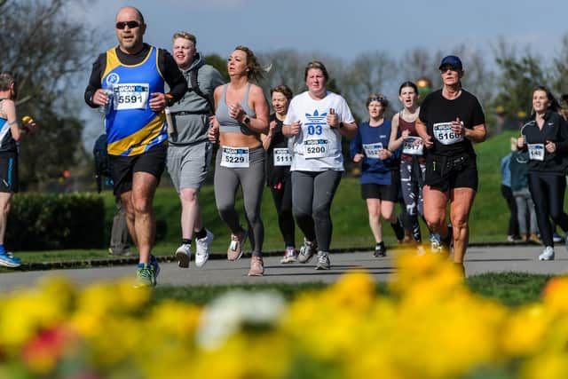 Participants pass through Mesnes Park during Run Wigan Festival 2022