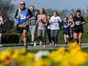 Participants pass through Mesnes Park during Run Wigan Festival 2022