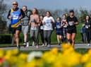 Participants pass through Mesnes Park during Run Wigan Festival 2022