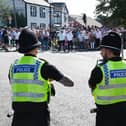 Members of the community gathered in Market Place, Standish to take part in a protest against plans to accommodate asylum seekers at Kilhey Court