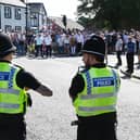Members of the community gathered in Market Place, Standish to take part in a protest against plans to accommodate asylum seekers at Kilhey Court