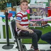 Jack Johnson cuts the ribbon at the new woodland fun hub