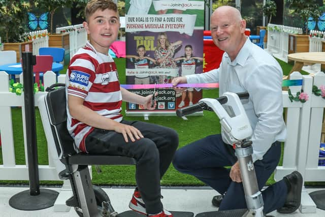 Jack Johnson cuts the ribbon at the new woodland fun hub