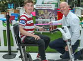 Jack Johnson cuts the ribbon at the new woodland fun hub