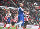 Jack Whatmough heads another all away against Sunderland