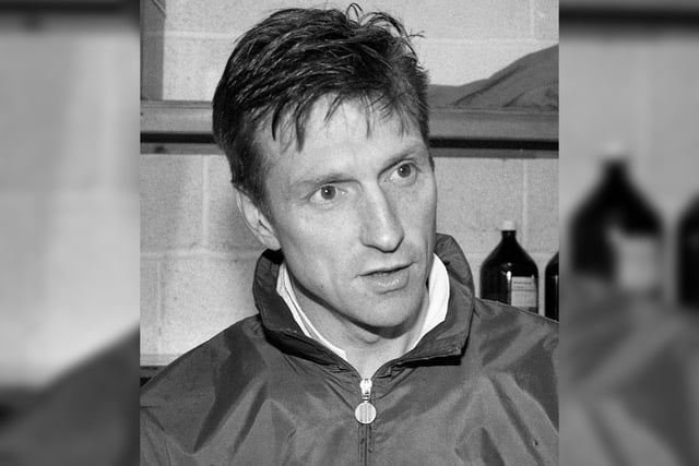 Wigan Athletic manager Kenny Swain faces the press after his team scraped a 2-2 draw against Northern Premier League side Leek Town in the FA Cup 1st round match.