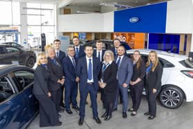 Kenny Jones, General Manager at Bristol Street Motors Wigan Ford with colleagues