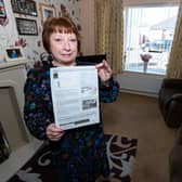 Pam Green wants to make people aware of the reduced time in parking at Robin Park after receiving a parking fine