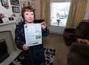 Pam Green wants to make people aware of the reduced time in parking at Robin Park after receiving a parking fine