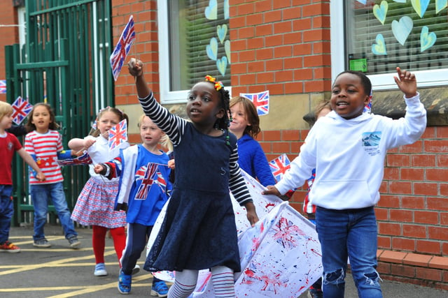 Staff and pupils at Mab's Cross primary school, Wigan, parade around the school, part of celebrations for the Queen's platinum jubilee.