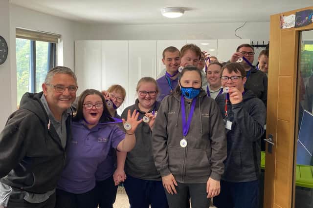 Coun Chris Ready with trainees at The Hamlet