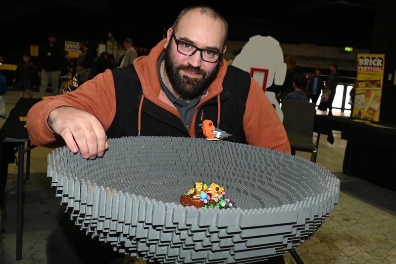 BLACKPOOL - 08-04-23  Lego fans enjoyed workshops, games, stalls and displays at Blackpool Brick Festival, held at the Winter Gardens, Blackpool.  Brick Festival organiser Mike Freeman, who built this bird bath from over 24,000 pieces of Lego.