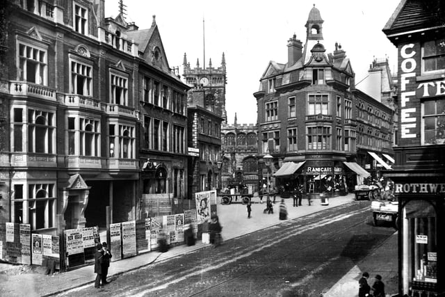 A familiar view of Wigan Wallgate in the 1890s showing the post office, the Dog and Partridge pub and Ranicars shop selling mantles and jackets and with a sale in progress. 