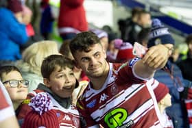 Tom Forber with fans and supporters following the win over Huddersfield