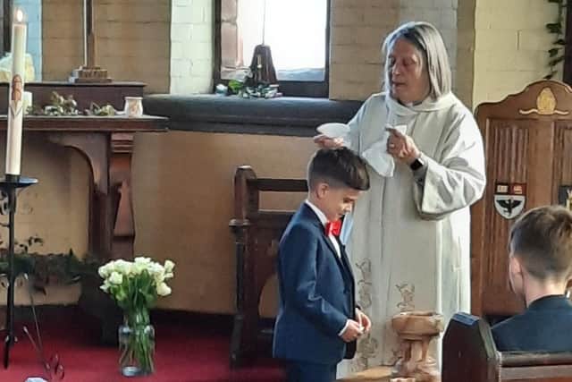 Six-year-old Abe Briffa's baptism was carried out at Hindley Cemetery's chapel by the Reverend Carol Close