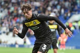 Luke Chambers will return to Liverpool after suffering a back injury that will keep him out for 'months'
