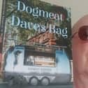 Alan Liptrot with the book that saved his life
