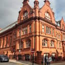 Businesses will be able to apply for a licence for the A-boards at the initial cost of £100 then £55 every year going forward, Wigan Town Hall (pictured) was told.
