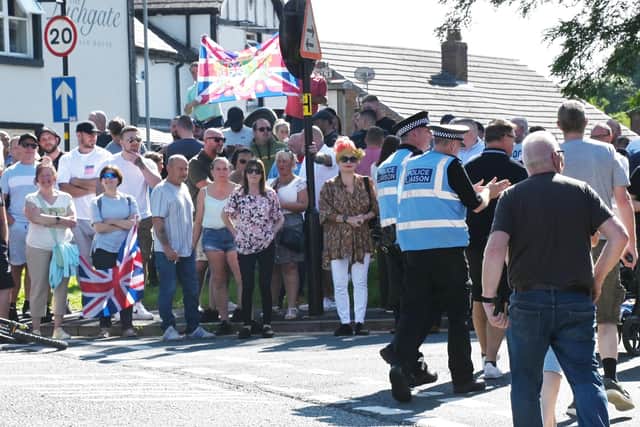 In September members of the community gathered in Market Place, Standish to take part in a protest against plans to accommodate asylum seekers at Kilhey Court. At the same time a counter protest was held by Wigan Stand Up to Racism.