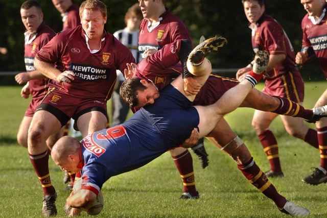 John McMullen with a flying tackle on Ovenden in a National Conference Division 1 match on Saturday 21st of October 2006. St. Judes won 34-6.