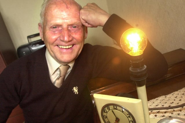 Light fantastic.....Stan Dawber of George Street, Newtown, with a light bulb which had been going for 65 years in April 2003.
The 15 watt bulb was bought by Stan's dad in 1938.