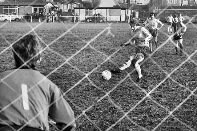 Sid Wallace scores from the penalty spot with one of his 4 goals for the Post and Chronicle Sunday League against Oldham Sunday League in the Lancashire Inter League Tourney quarter-final at Ashton Town's ground on Sunday 21st of December 1980. The Post League won in a competition record win 11-2.