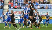 Tom Naylor heads home against Cambridge