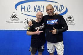 MC Kali Group's Mel Corrigan with MMA coach Erik Paulson