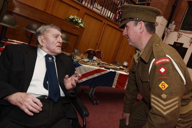 Dave Myers from the Living History Museum, right, chats with Wigan's oldest veteran Harry (Henry) Cullen, 99.