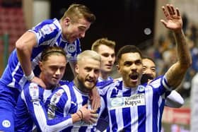 Captain Josh Magennis set Latics on the way to a comfortable victory over Carlisle