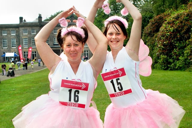 Limbering up before the start of the Race for Life at Haigh Hall are Sherry Higham and daughter Jade on Wednesday 28th of June 2006.
