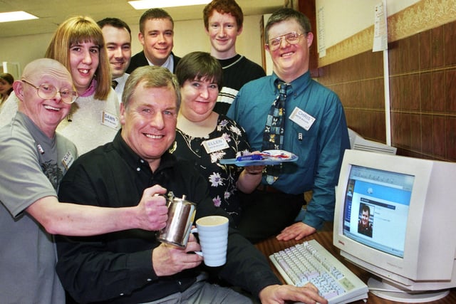 Manchester City manager Joe Royle finds the net in Wigan as he officially opens the town's first internet cafe in Rodney House, King Street, on Monday 28th of February 2000.
Helping him out at the netcafe are BETA students and Wigan Technology managing directors Richard Walsh and Steve Halliwell.