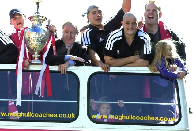 Maurice Lindsay and players on the bus after winning the Challenge Cup in 2002.