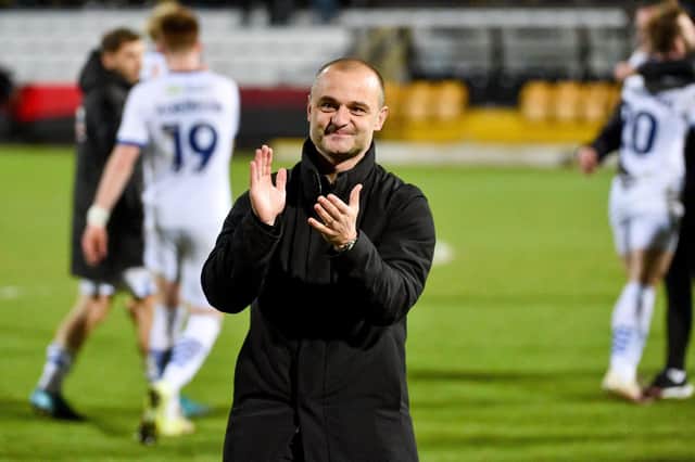 Shaun Maloney thanks the travelling Latics fans after the victory at Cambridge on Saturday