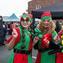 Jodie (Jingles), Anna (Bells) and Holly (Rock) the Christmas elves at Pemberton Christmas Market