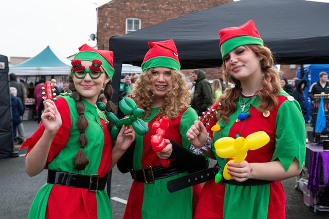 Jodie (Jingles), Anna (Bells) and Holly (Rock) the Christmas elves at Pemberton Christmas Market