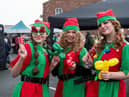 Jodie (Jingles), Anna (Bells) and Holly (Rock) the Christmas elves at Pemberton Christmas Market